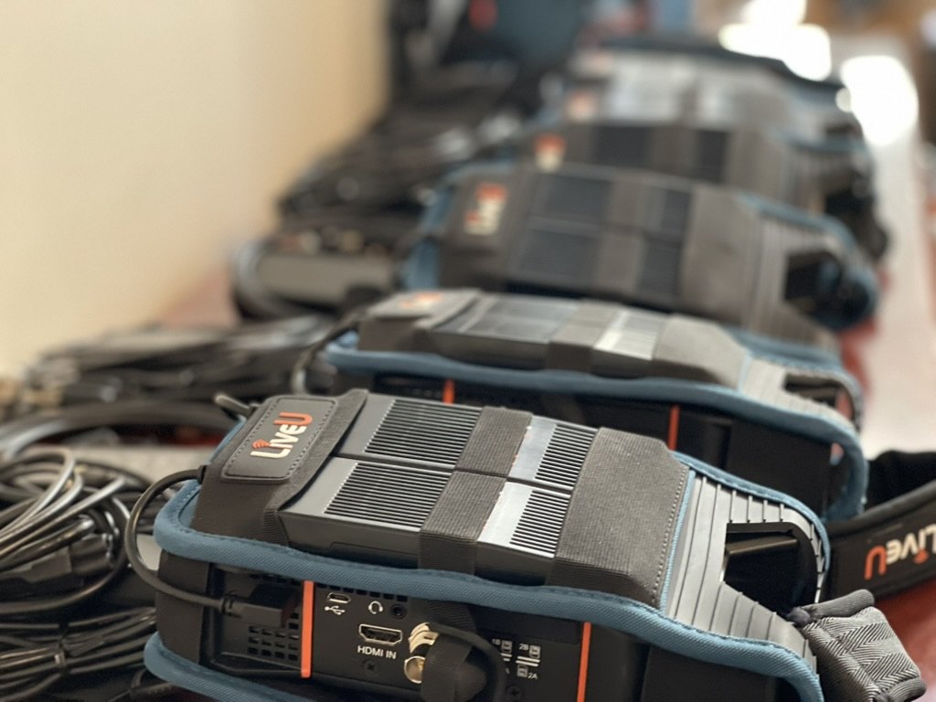 LiveU units being prepped: HDMI and SDI inputs cabled before the links went in