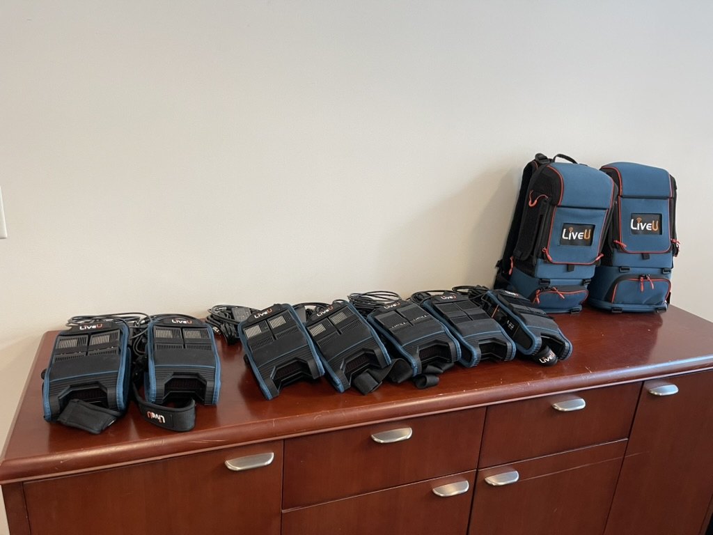 The LiveU units gathered before deployment, carry bags packed